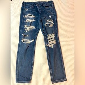Like New American Eagle Ripped Skinny Jeans. 14 Short. Medium Blue